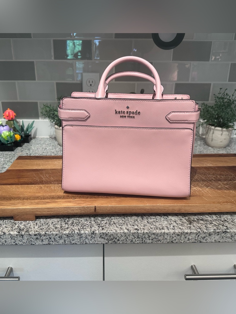 Kate Spade New York structured satchel in a blush pink saffiano leather